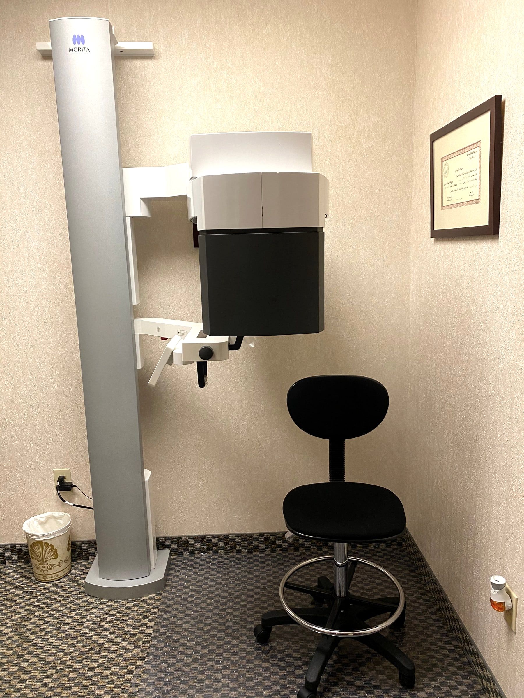 The small-field 3D cone beam scanner in its imaging room