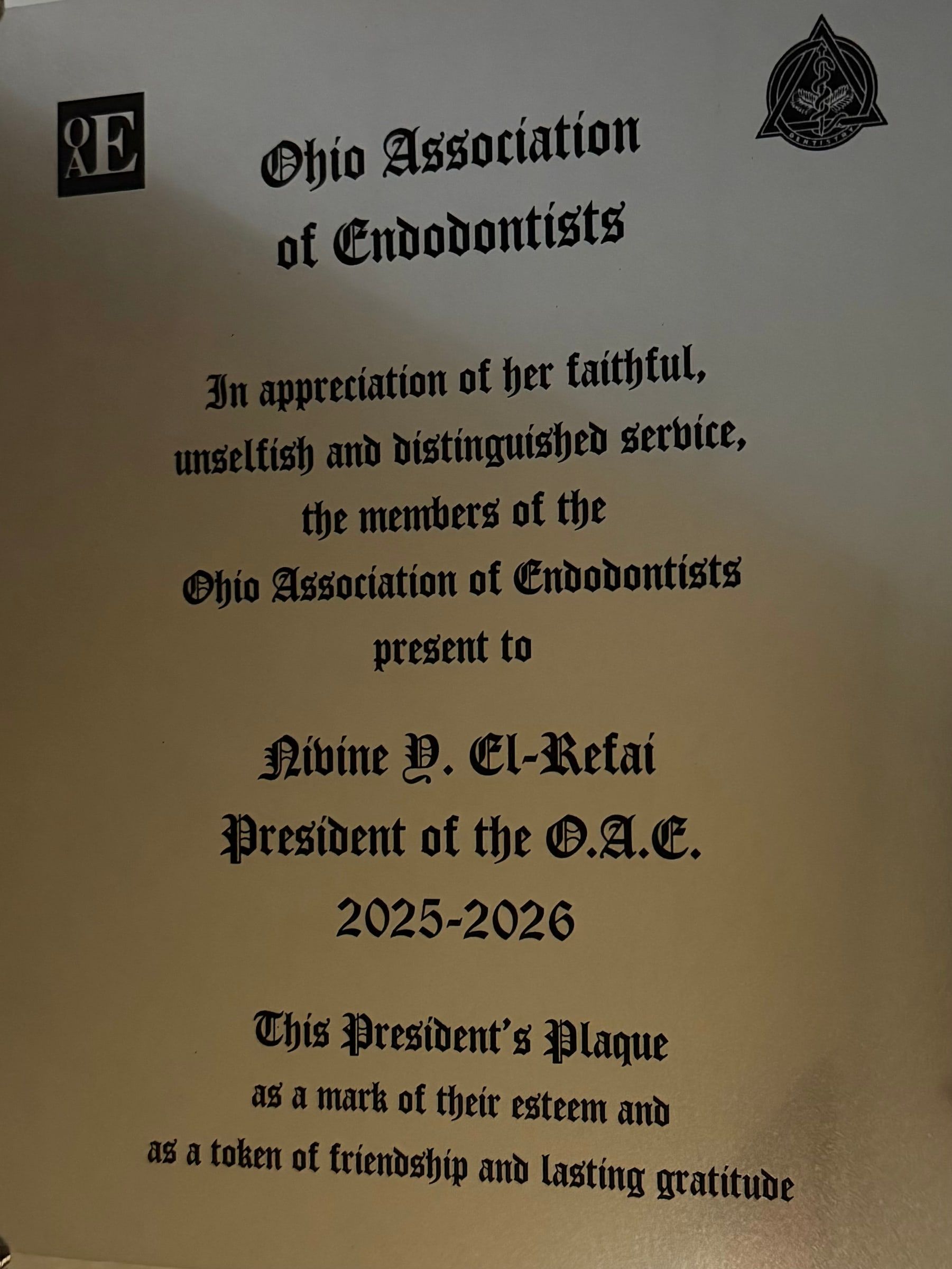 The Ohio Association of Endodontists President's Plaque presented to Nivine Y. El-Refai, President of the O.A.E., 2025 to 2026